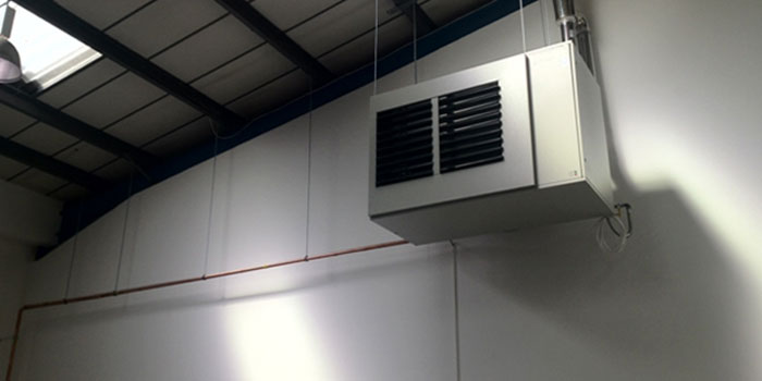 Suspended unit heater, warehouse